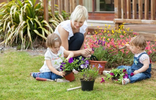 Gardening team preparing tools for a service booking